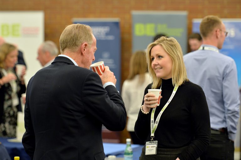 Attendee's discuss the day of networking and presentations Construction Frameworks Conference, Kensington Town Hall. 02.10.19