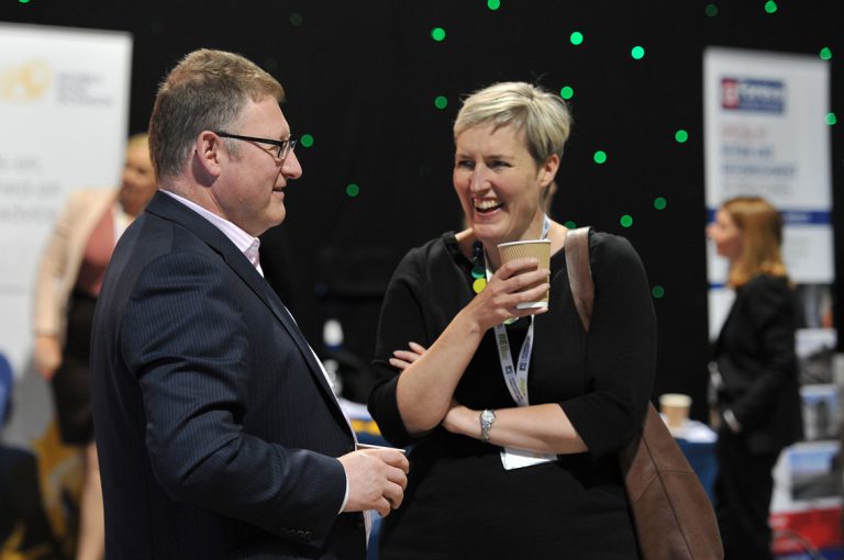 Attendees-network-over-a-cup-of-coffee-at-West-Yorkshire-Development-Conference