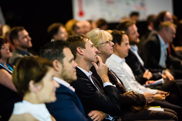 Attendee's watch the Panel at