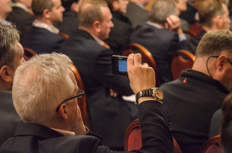 Attendee takes a photo of the speakers at Liverpool Development Plans 2018