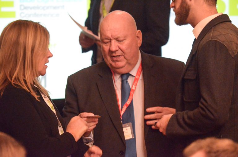 Joe Anderson hands out a business card at Liverpool Development Plans 2018