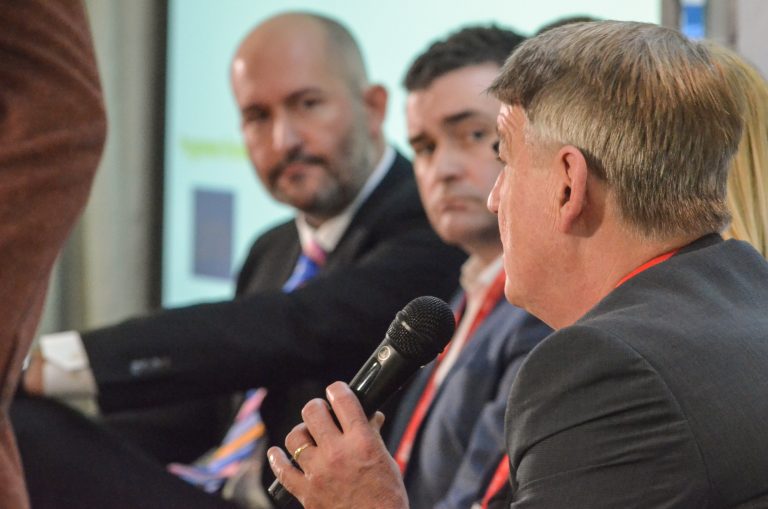 Martin Gannon answering question as Keith McDougall and Neil McMillan watch on