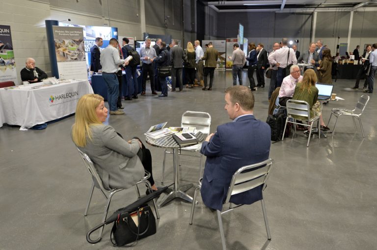 2 attendee's sit and discuss the day over a cup of coffee Manufacturing Conference & Exhibition 2019