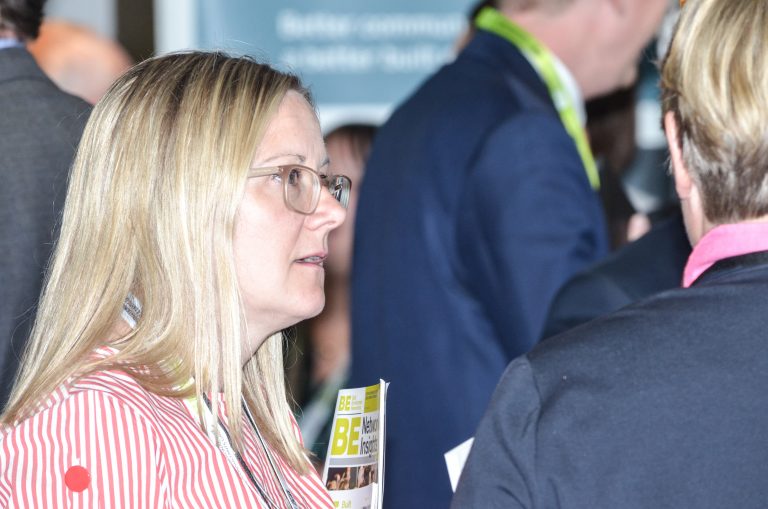 Attendee's talk over drinks at St Marys Football Stadium