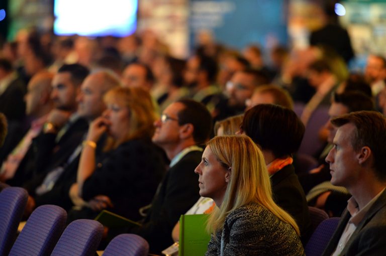 Attendee's watch the Investing into Infrastructure Panel Scotland Development Conference