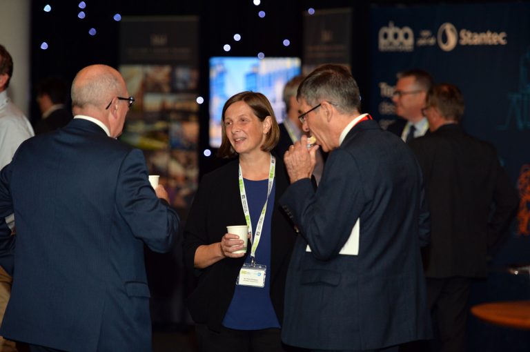 Networking in the main hall at the EICC