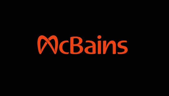 Logo Partner McBains Construction Bidding Blue Light